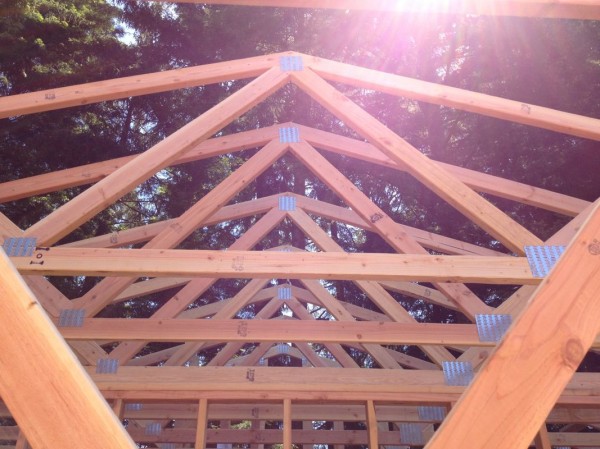 These trusses are the backbone of the new garage's roof