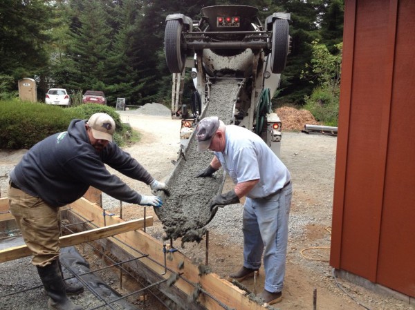 Dan and Sean worked the chute while I spread the concrete and made sure it set up against the form boards