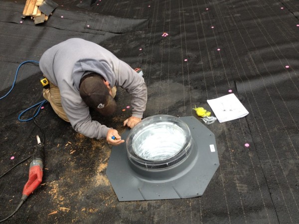 Sean installing the first solar tub dome