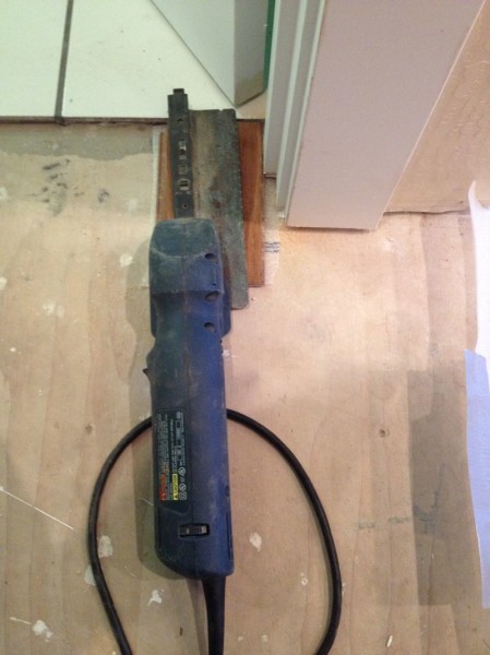 Flat saw positioned to cut trim