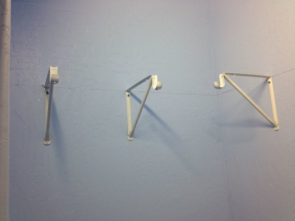 Shelf brackets and hooks for the bedroom closet