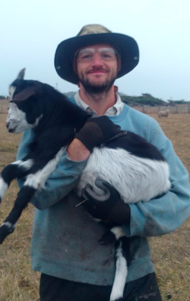 Me with a cuddly goat kid