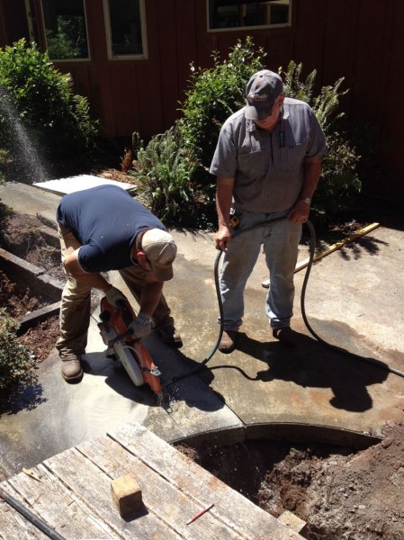 Sean cutting concrete