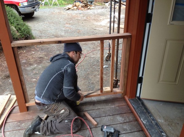 Matt working on deck railing