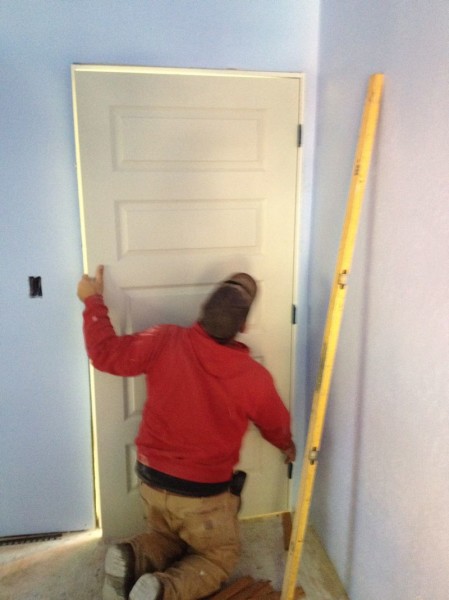 Fitting the interior door into the jamb