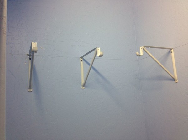 Shelf brackets and hooks for the bedroom closet