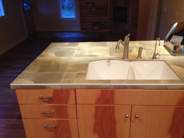 Carbonneau tiler came to finish the sink and bar